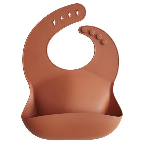 Silicone bib Mushie clay red